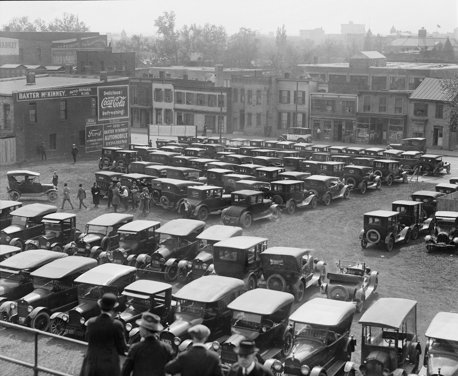Parking lots for cars become part to the American landscape in the 1920s.  Image shows autos parked at ball park near Washington, D.C. in 1923.